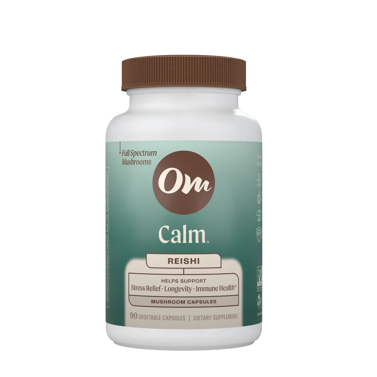 Om Calm Reishi capsules in front of a Reishi mushroom